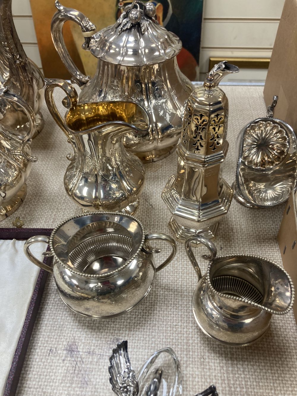 A Victorian silver plated four piece tea set, assorted plated flatware,etc.